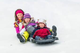 Family sledding at Happy Valley Mt. Ruapehu